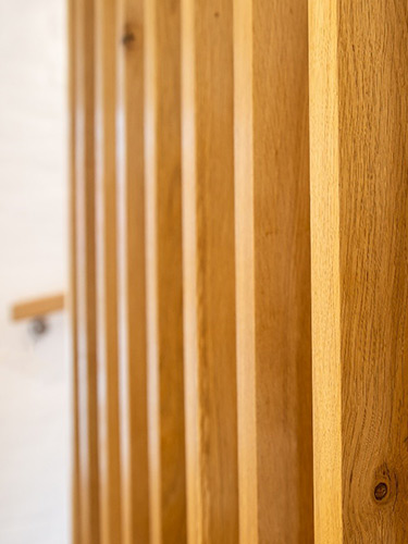 Vertical-oak-stair-hangers